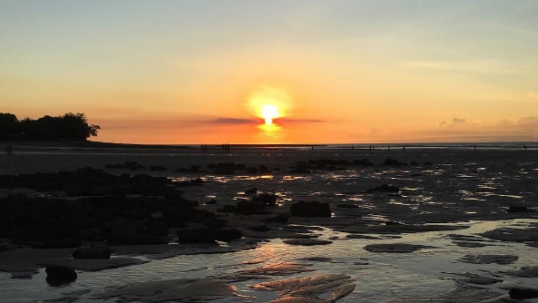 The sun sets at Nightcliff Beach.