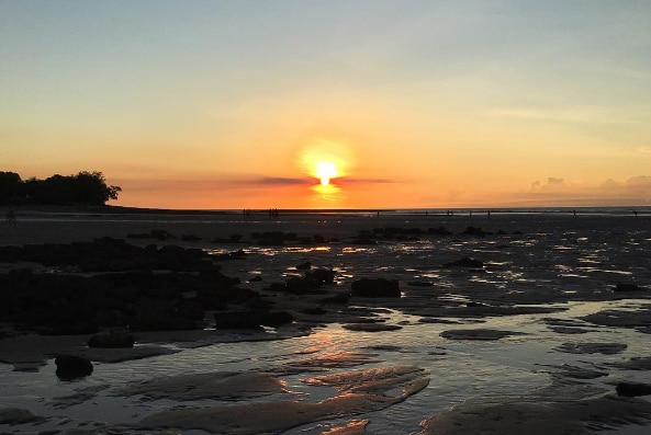 The sun sets at Nightcliff Beach.