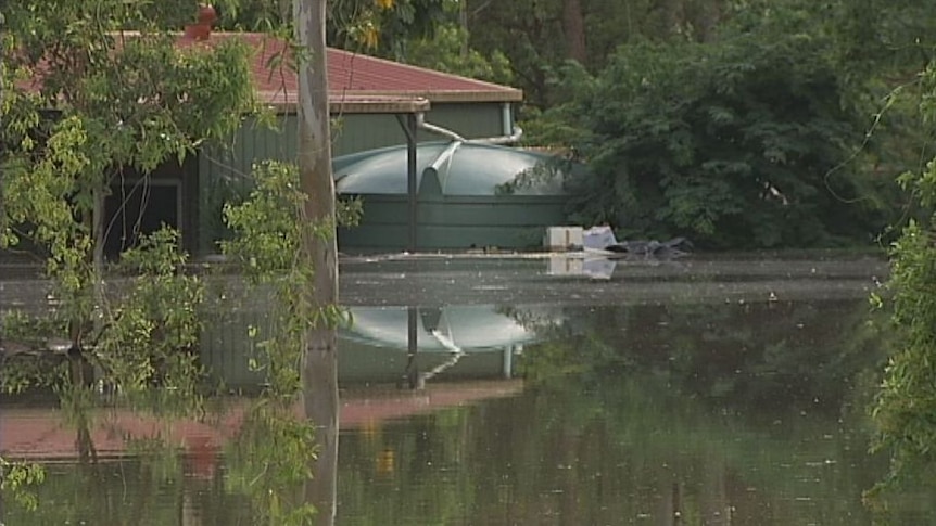 Logan residents count costs of record flood
