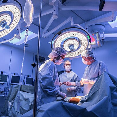 surgeons working in an operating theatre