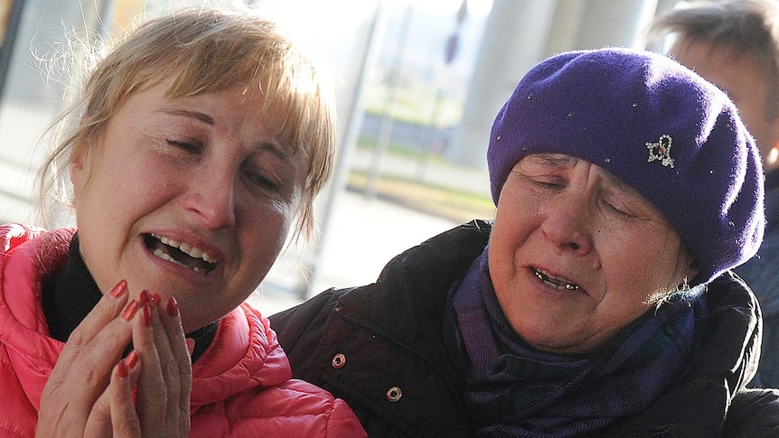 Relatives at Pulkovo airport waiting for news of loved ones after Russian plane crash