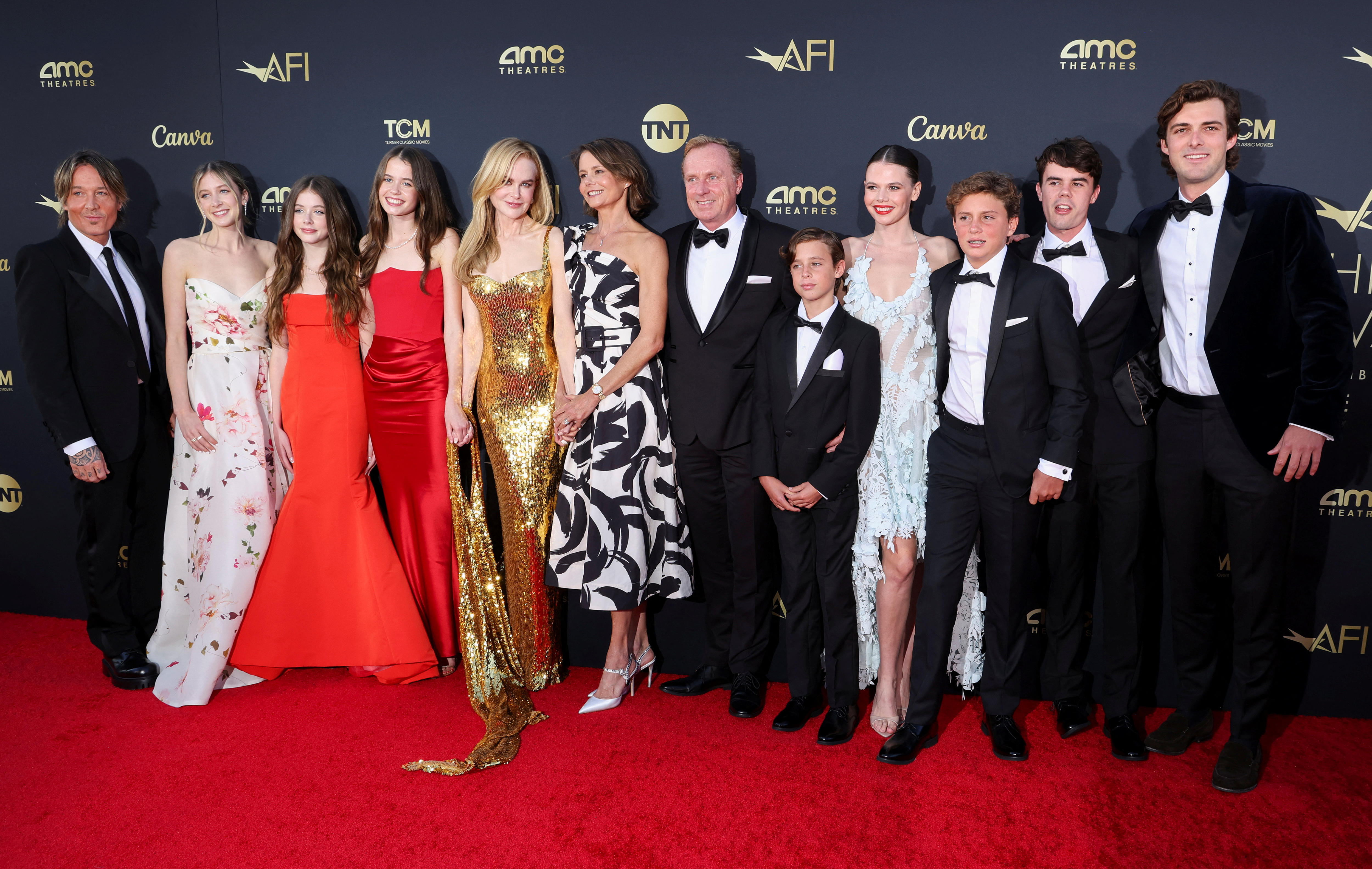 A large group family photo of Nicole Kidman, Keith Urban, their children and extended family