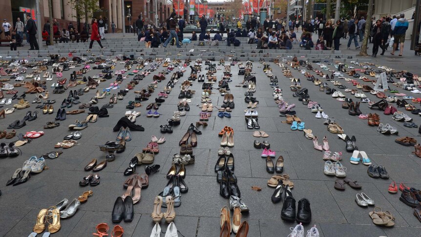 1,400 pairs of shoes, representing the average number of people killed on Australian roads each year