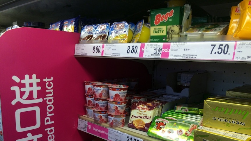 Imported cheese stacked in a supermarket shelf