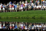 Fans on the 16th hole watch a practice round at Augusta.