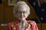 Cobar mayor Lilliane Brady in the council chambers wearing her gold mayoral chain.