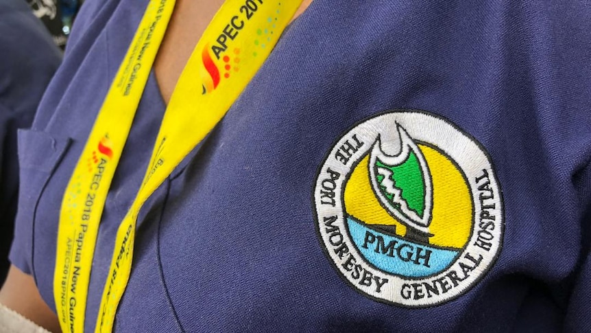 A closeup photo of a nurses badge in Port Moresby's General Hospital.