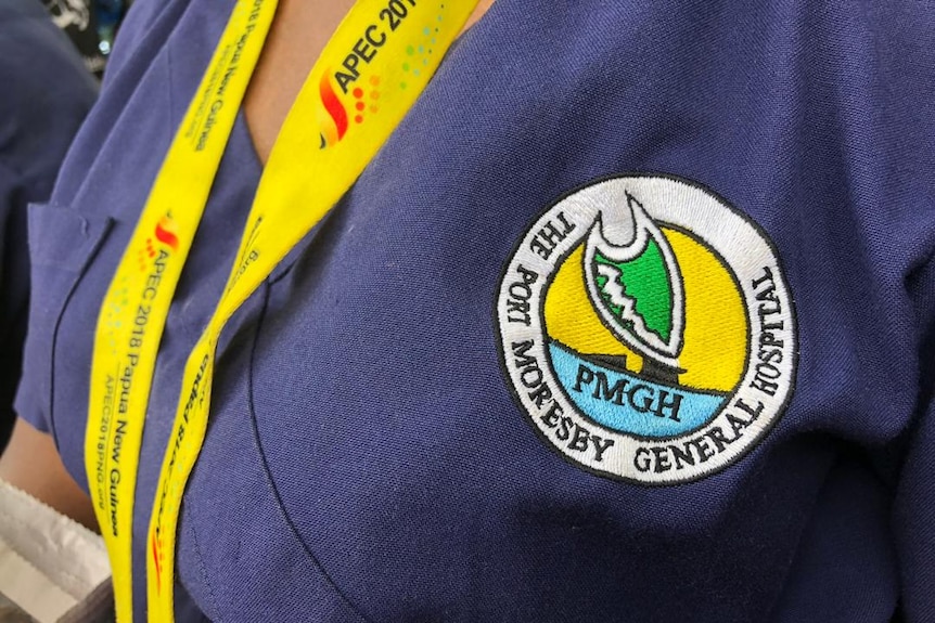 A closeup photo of a nurses badge in Port Moresby's General Hospital.