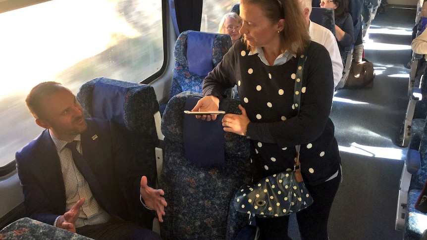 ACT Chief Minister Andrew Barr on a train.