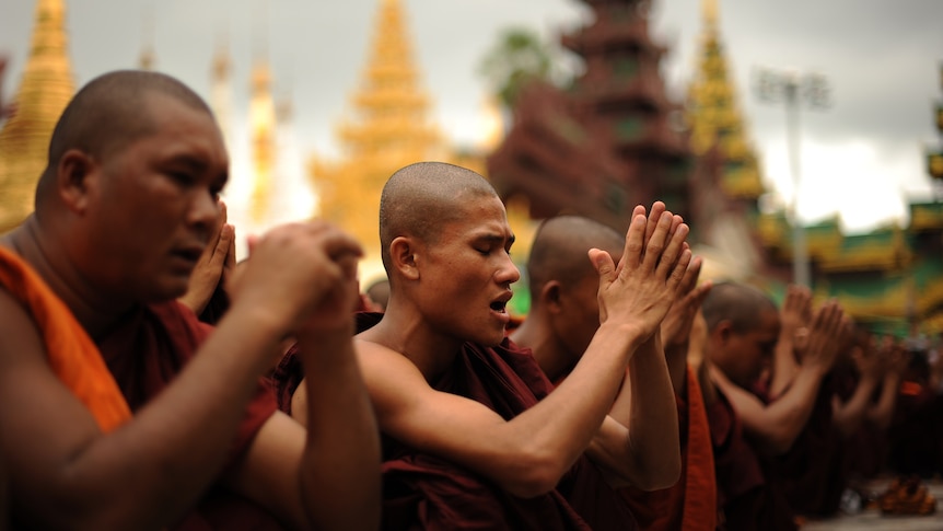 Rakhine Buddhist monks pray in the wake of deadly unrest.