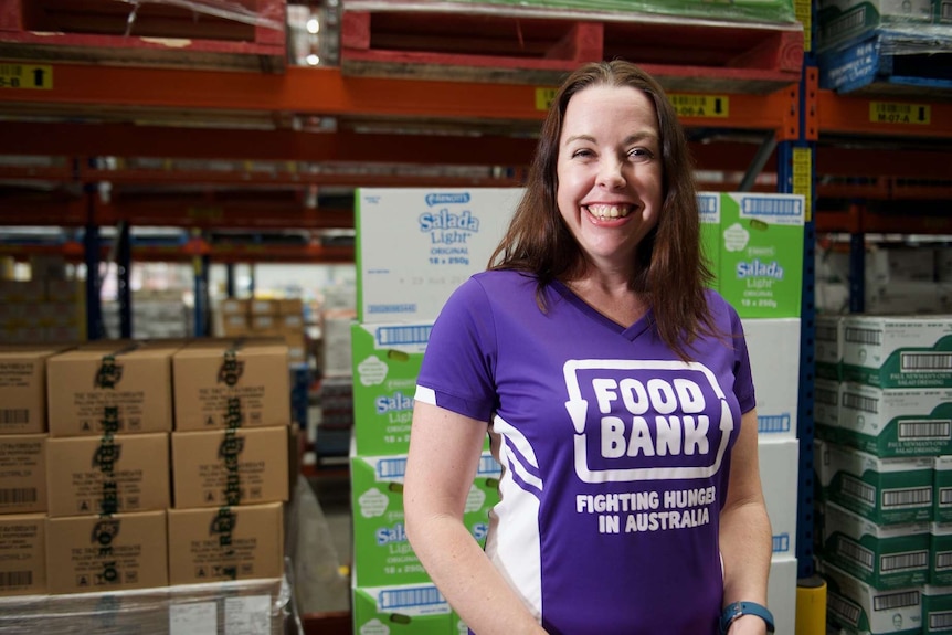 Foodbank chief Brianna Casey smiles at the camera.