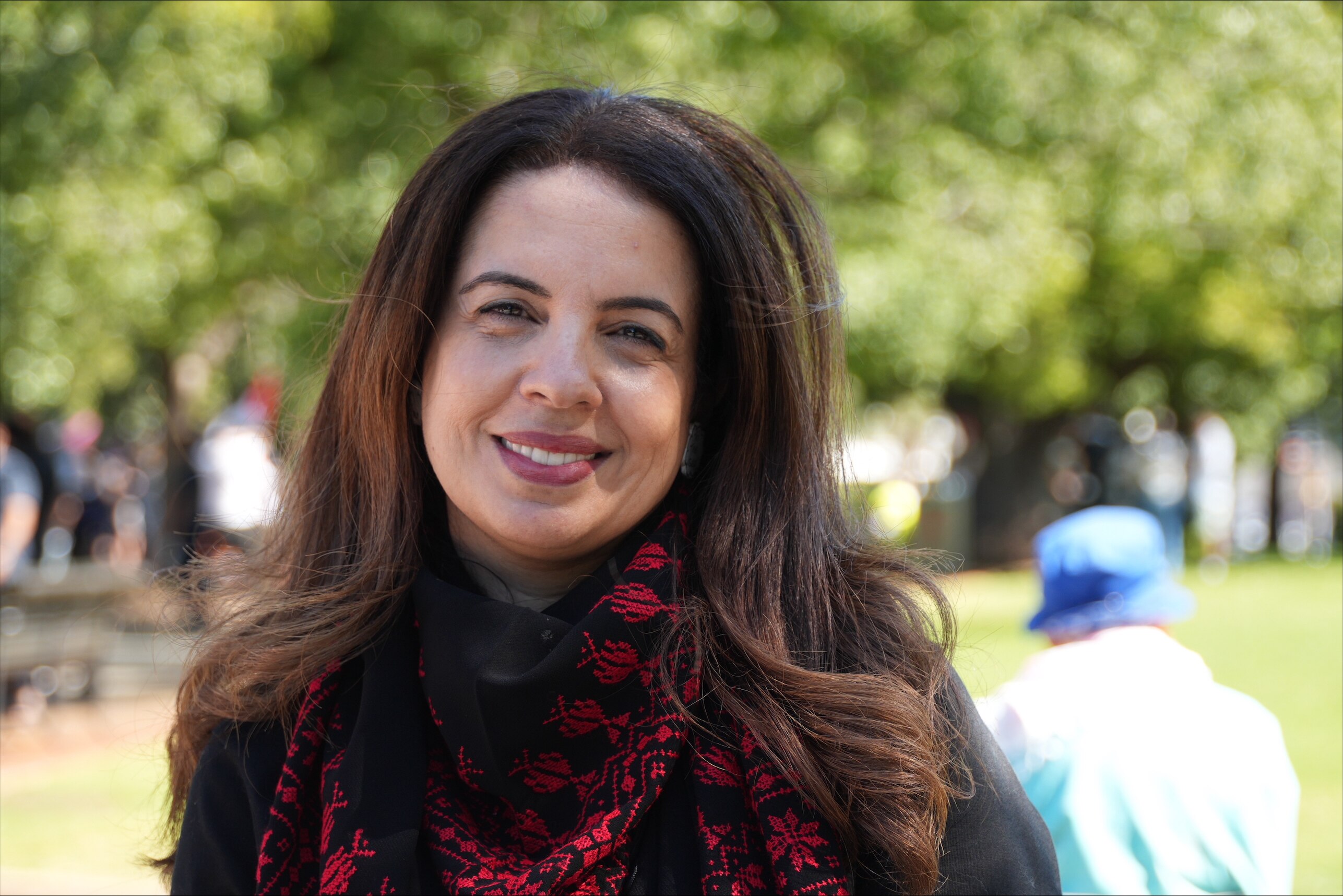 Hiba Farra a pro-palestine protesters looks at the camera at a rally in western australia