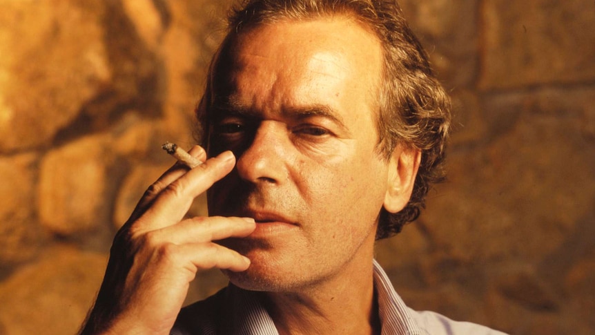 Portrait of Martin Amis, British author, smoking.