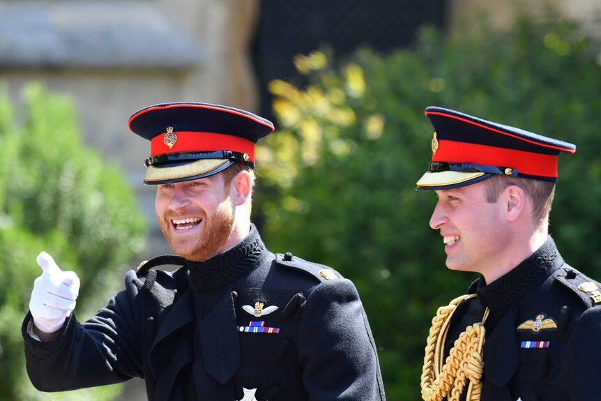 Prince Harry walks with his best man, the Duke of Cambridge, as he arrives at St George's Chapel.