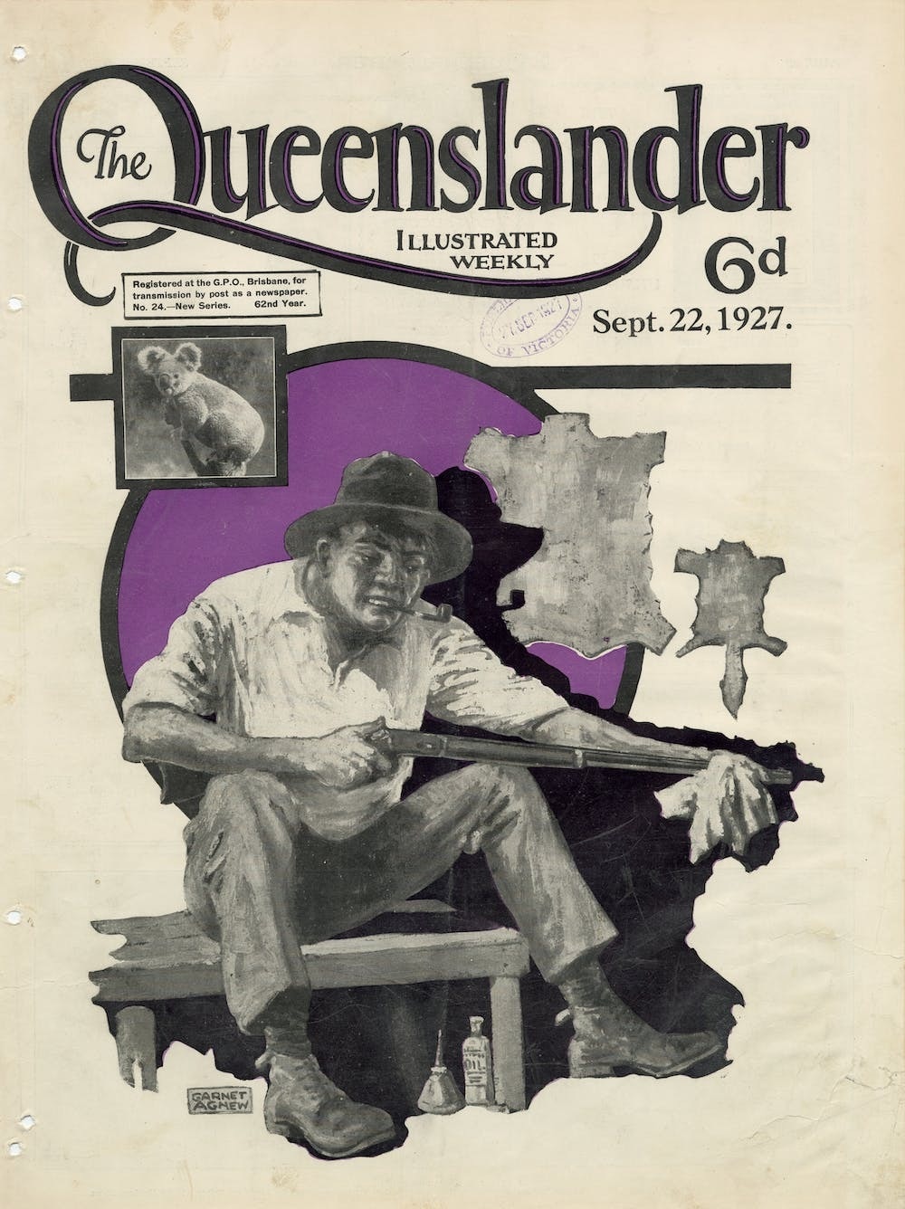 a magazine cover with an illustration of a man cleaning a rifle and a koala