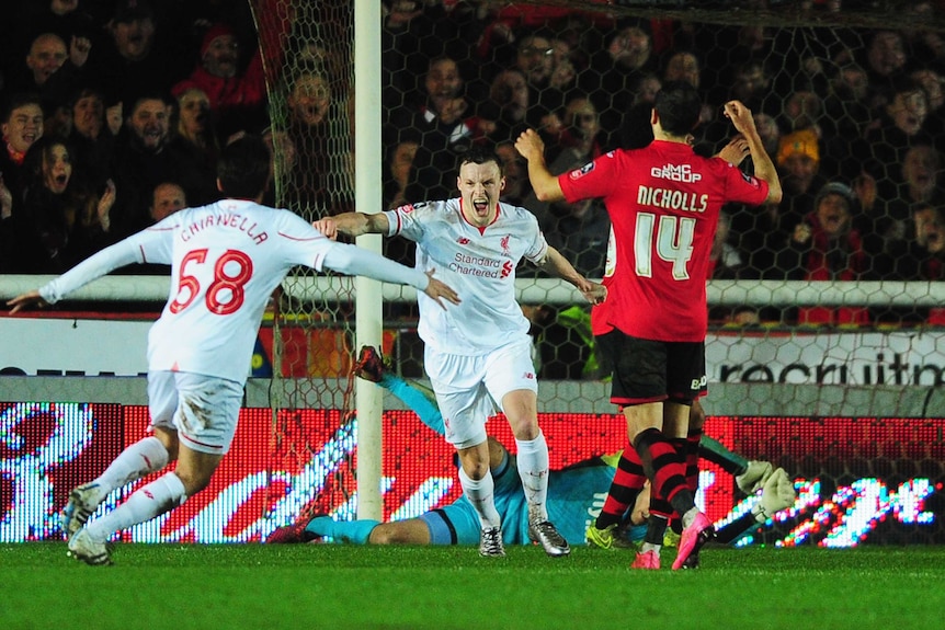 Brad Smith celebrates scoring for Liverpool