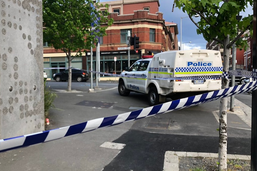 Police at the scene of a body found at Royal Hobart Hospital, October 23, 2018.