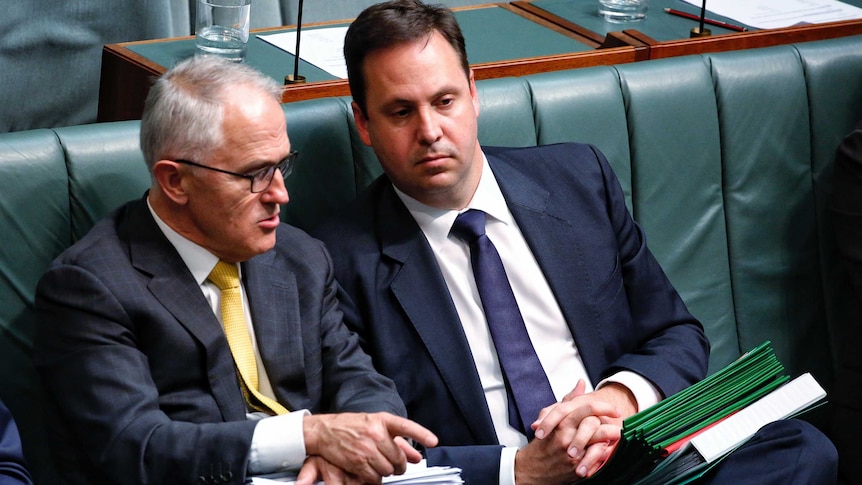 Prime Minister Malcolm Turnbull and Steven Ciobo sit together in Question Time, November 22, 2016.