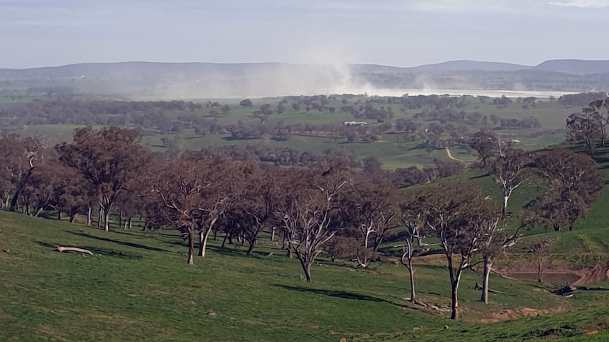 Tailings dust in the wind.