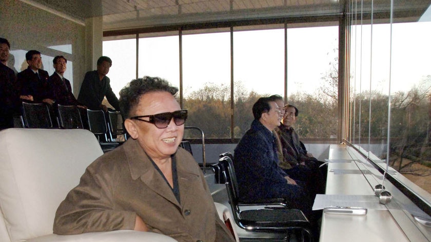 An undated picture released on November 2, 2008, shows North Korean leader Kim Jong-Il enjoying a fo
