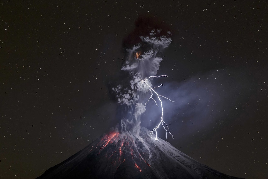 Colima Volcano in Mexico shows a powerful night explosion with lightning, ballistic projectiles and incandescent rockfalls.
