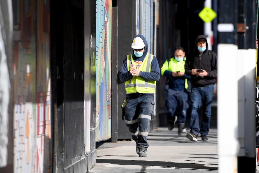 construction workers walking on a site