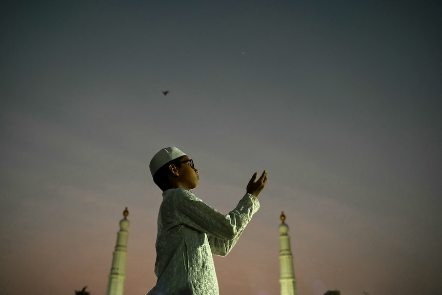 A Muslim devotee offers prayers at a mosque in Chennai.