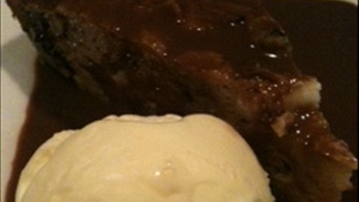Easter bun pudding with chocolate easter egg sauce - ABC Everyday