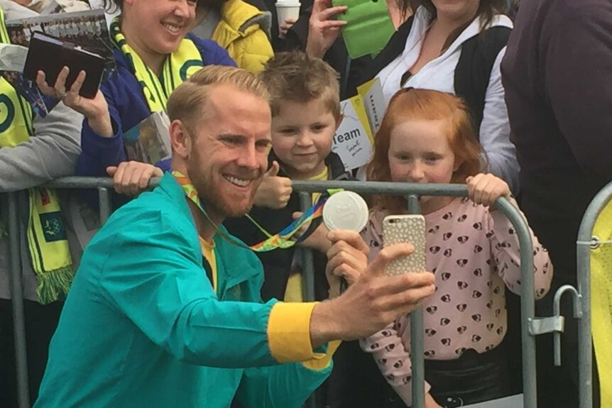 Cameron Girdlestone takes a selfie for fans in Hobart