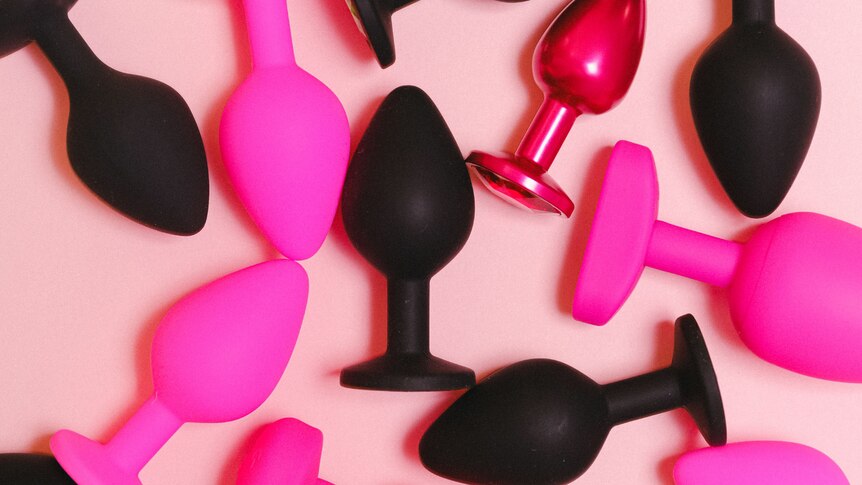 black and pink sex toy butt plugs