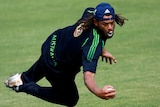 Andrew Symonds fields a ball at training