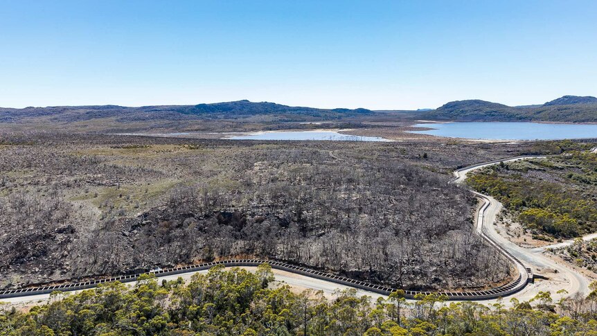 Aerial view of Lake McKenzie in Tasmania's Wilderness WHA one year after after 2016 bush fire.