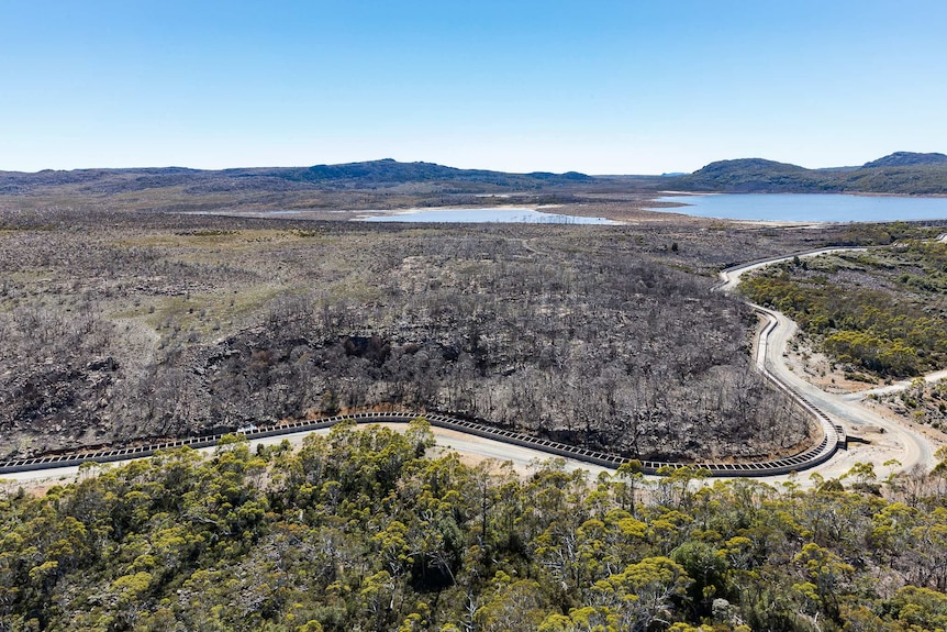 Aerial view of Lake McKenzie in Tasmania's Wilderness WHA one year after after 2016 bush fire.