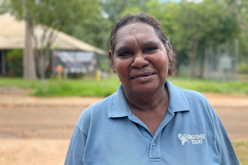 Headshot of an Indigenous woman standing outside.