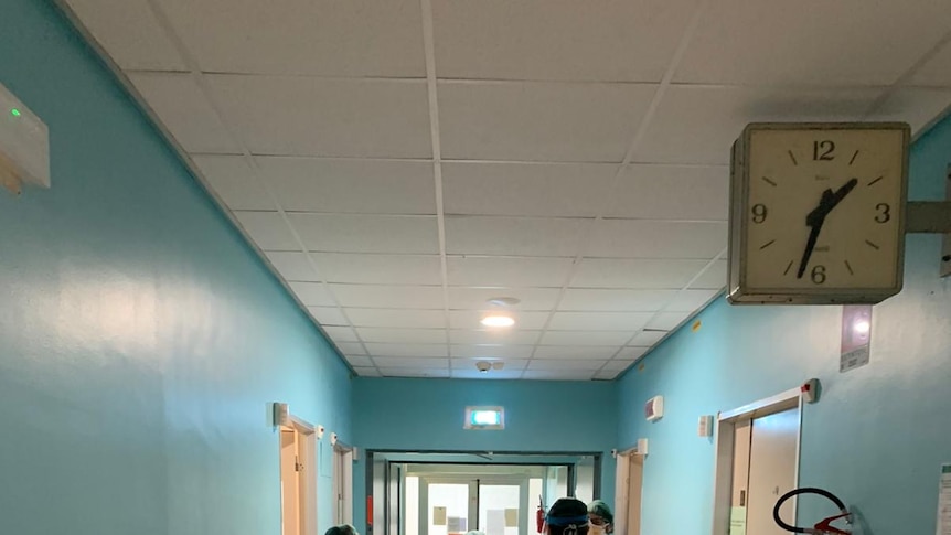Doctors in the hallway of Cremona hospital.