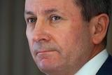 A headshot of Mark McGowan looking serious.