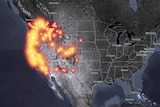 A map of the west coast of the United States with many glowing dots symbolising fires.