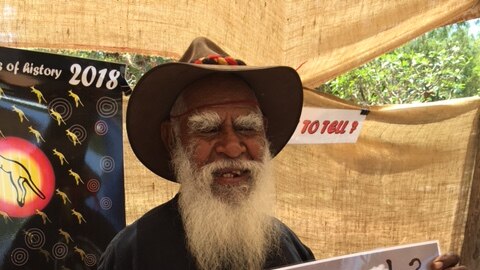 John Watson holding Noonkanbah protest photo