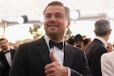Leonardo DiCaprio gives thumbs up on the red carpet