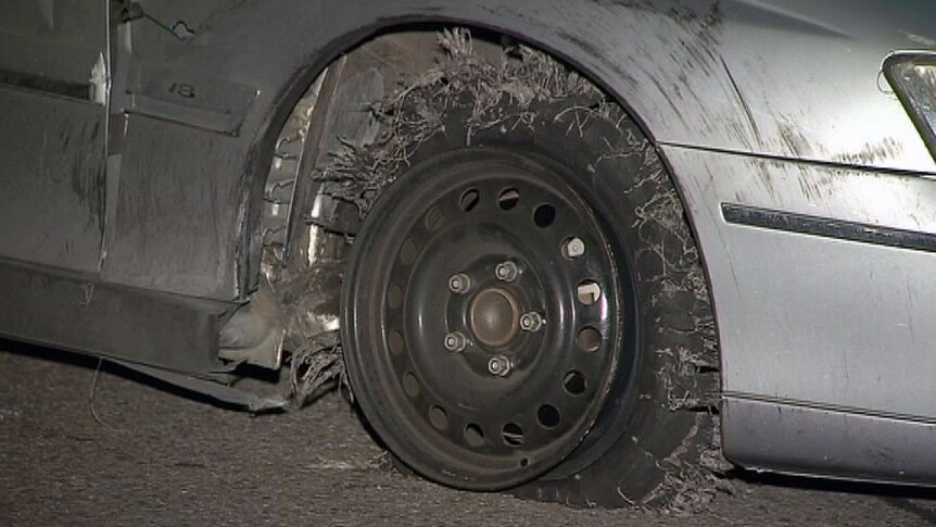 Tyre of car stopped by road spikes