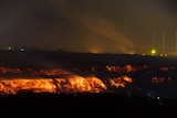Wider night shot of coal face burning at Hazelwood mine fire February 25, 2014.