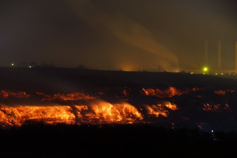 Wider night shot of coal face burning at Hazelwood mine fire February 25, 2014.