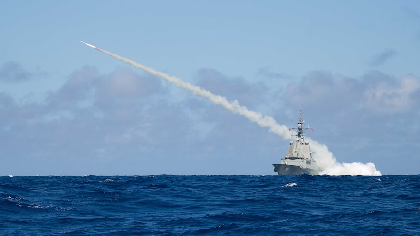 A military ship fires a missile