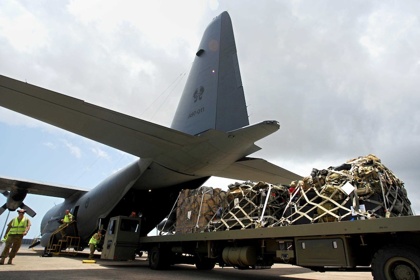 Equipment is loaded onto a C-130H Hercules.