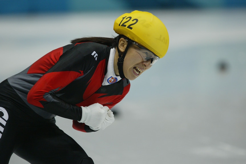 Speed skater lets out emotion after winning a gold medal. 