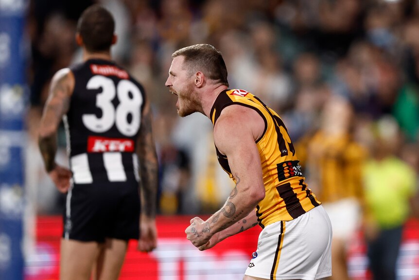 Blake Hardwick pumps both fists and yells in delight