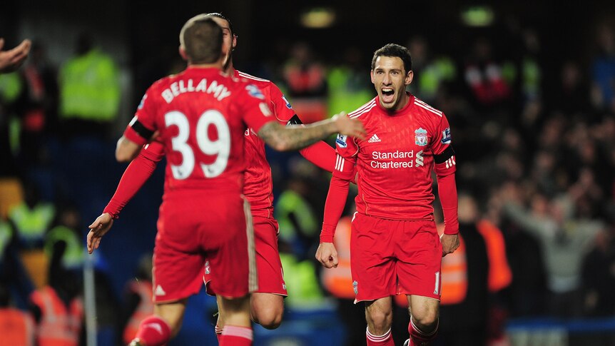 Maxi Rodriguez celebrates with Liverpool team-mates