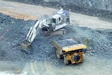 Earthmovers at a mine site