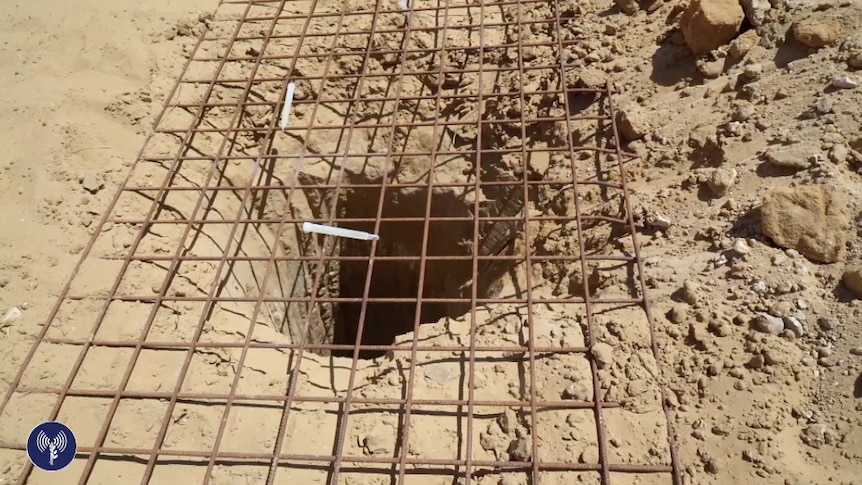 Wire covers the opening of an underground tunnel discovered in Gaza. Wire covers the opening of an underground tunnel discovered in Gaza.