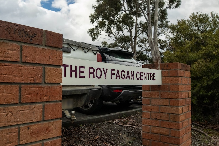 A sign saying "Roy Fagan Centre" outside a carpark